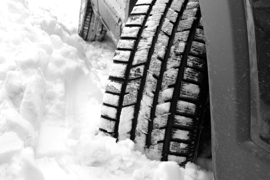 Car winter tires in snow