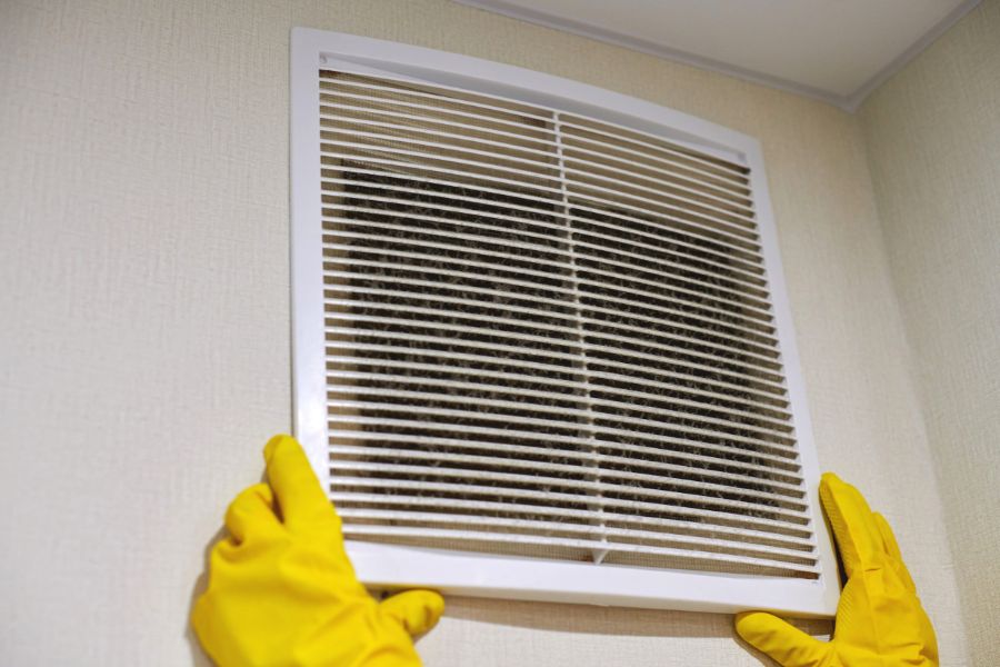Opening clogged air ventilation grill to clean