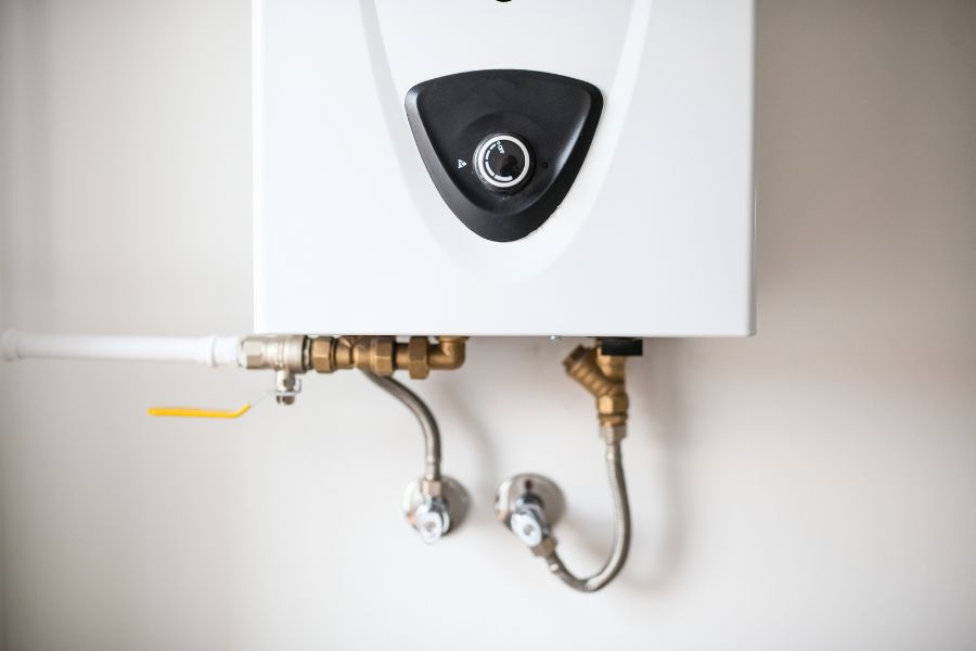 Modern gas water heater with temperature control knob