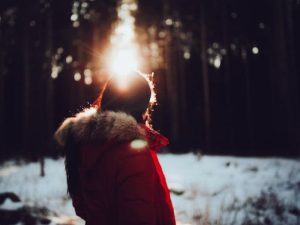 lady wearing heavy red colored winter jacket