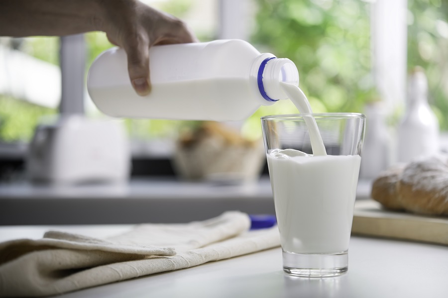 pouring milk in glass