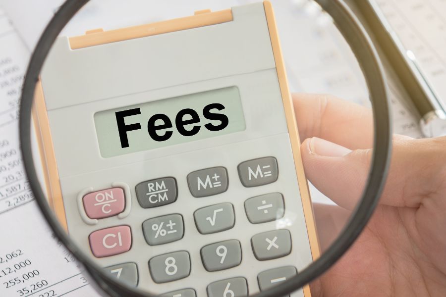 Fees text displayed on calculator and magnifier