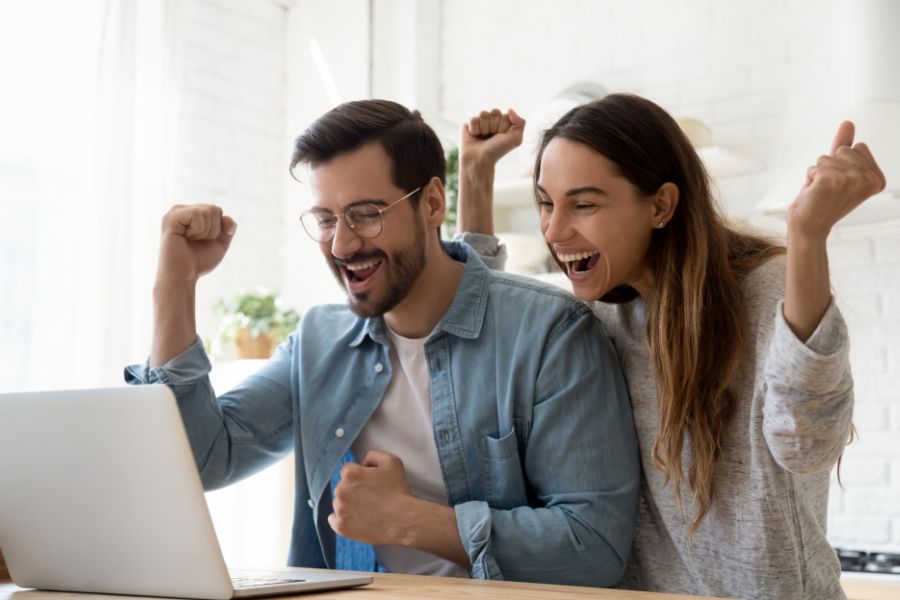 Couple celebrating lottery winning