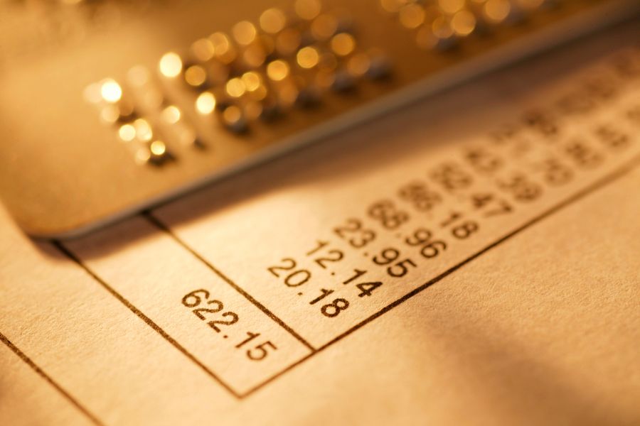 Close up of credit card charges from a bill